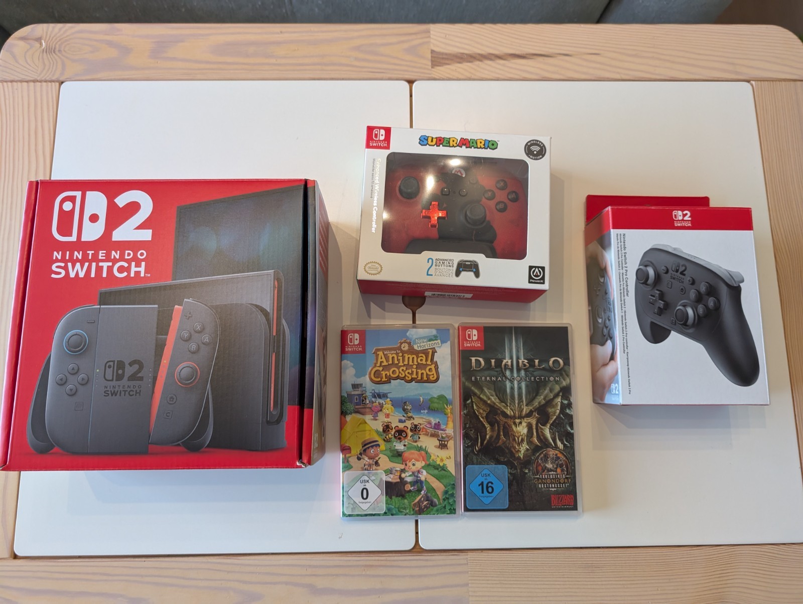 Nintendo Switch 2 mit 2 Spielen und Pro Controller Nintendo Switch 2 mit 2 Spielen und Pro Controller